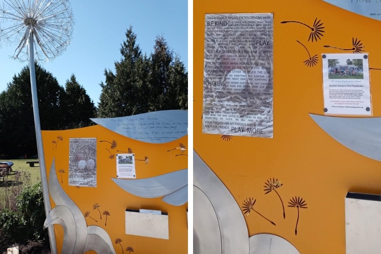 A yellow sign at the Seattle Children's PlayGarden is decorated with dandelions and a metal dandelion statue.